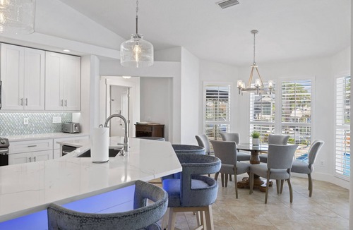 Pelican House | Unbeatable Direct Gulf Access Heated Pool Home with a Hot Tub and 6 bedrooms!