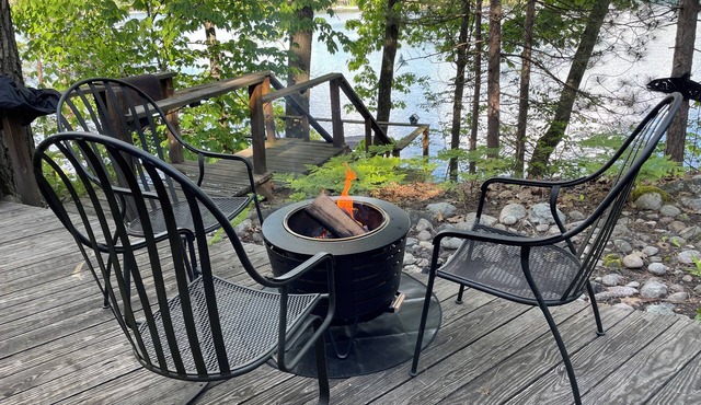 Beautiful lakefront setting with pontoon boat available to rent. in Mancelona