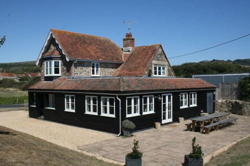 Greystone Cottage - Sea views, short stroll to a beautiful sandy beach in Brook