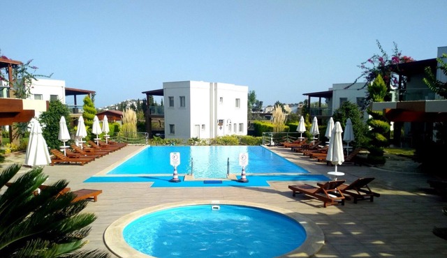 Luxury self catering 3 bedroom holiday villa with communal pool in the centre. in Bodrum