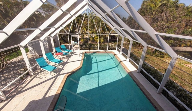 Naples Beach Escape | Pool, Canal Views & Tiki Vibes Near Pier & 5th Avenue in Naples