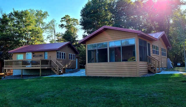 Two cabins right on the lake, including shared game room! in Backus