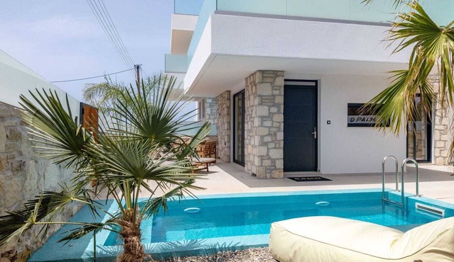 Villa Happiness is a luxurious retreat that harmonizes sustainable living in Chania